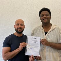 Receiving my certificate of completion